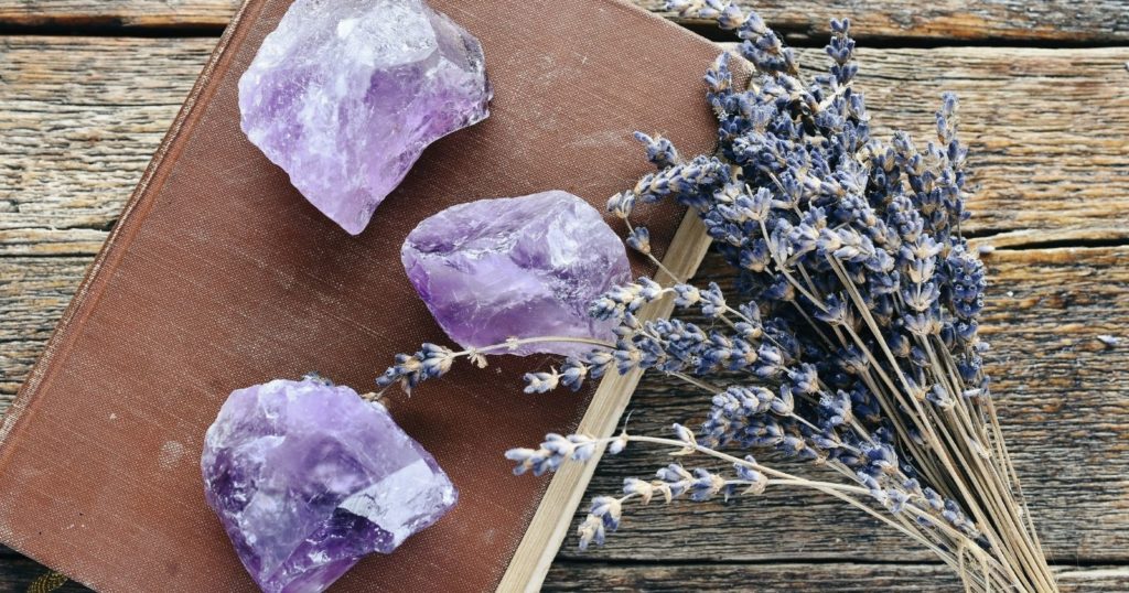 Crystal Subscription Box with three purpose crystals and lavender on a table