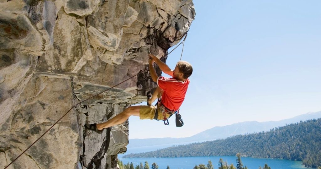Man rock climbing a mountain