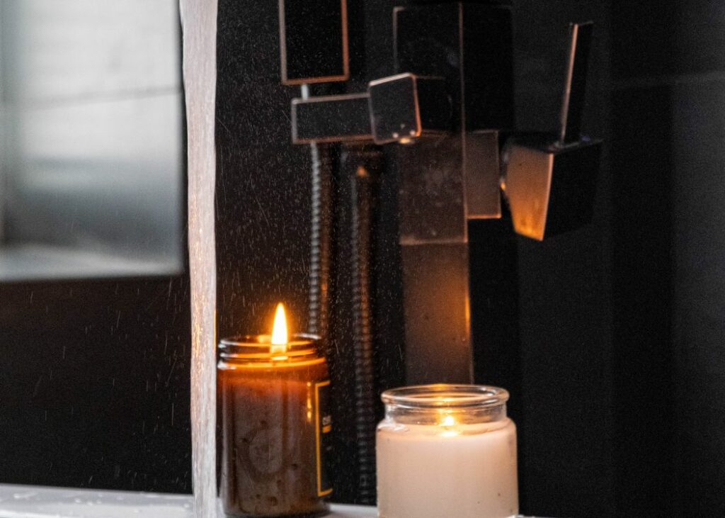 A shower with candles for setting a relaxing environment
